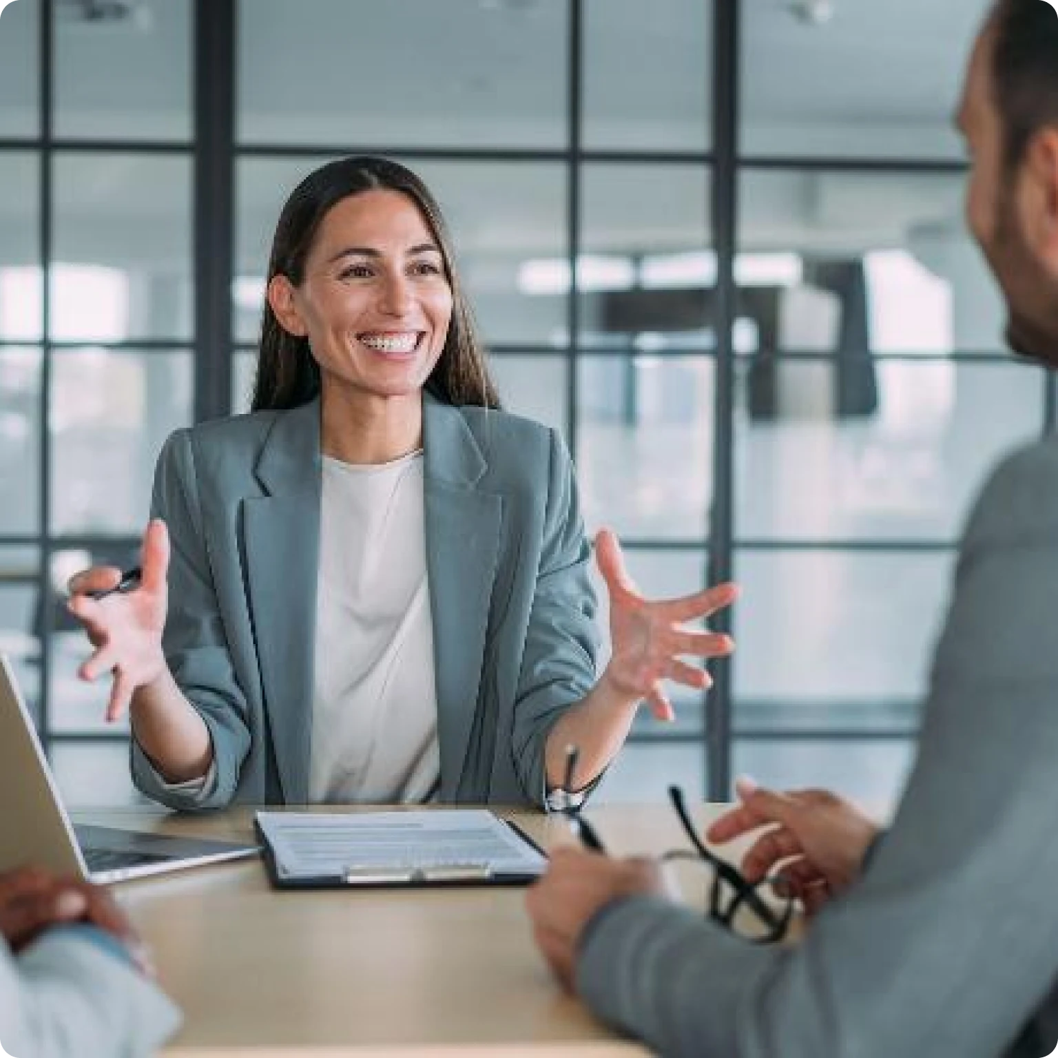 A business professional analyzing a digital chart